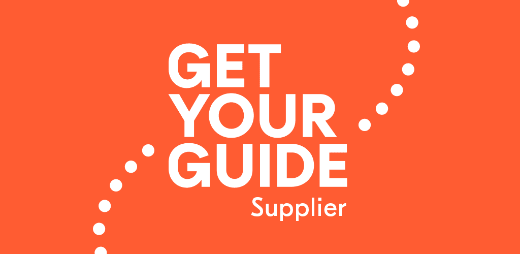 Orange background with Get Your Guide Supplier written in white, reminiscent of the vibrant hues seen on trips to Vlora. White dots elegantly form curves around the text, like waves gently caressing a boats hull.